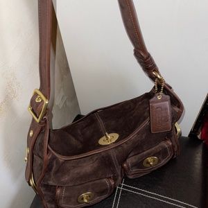 Woman’s Pocket Coach Bag